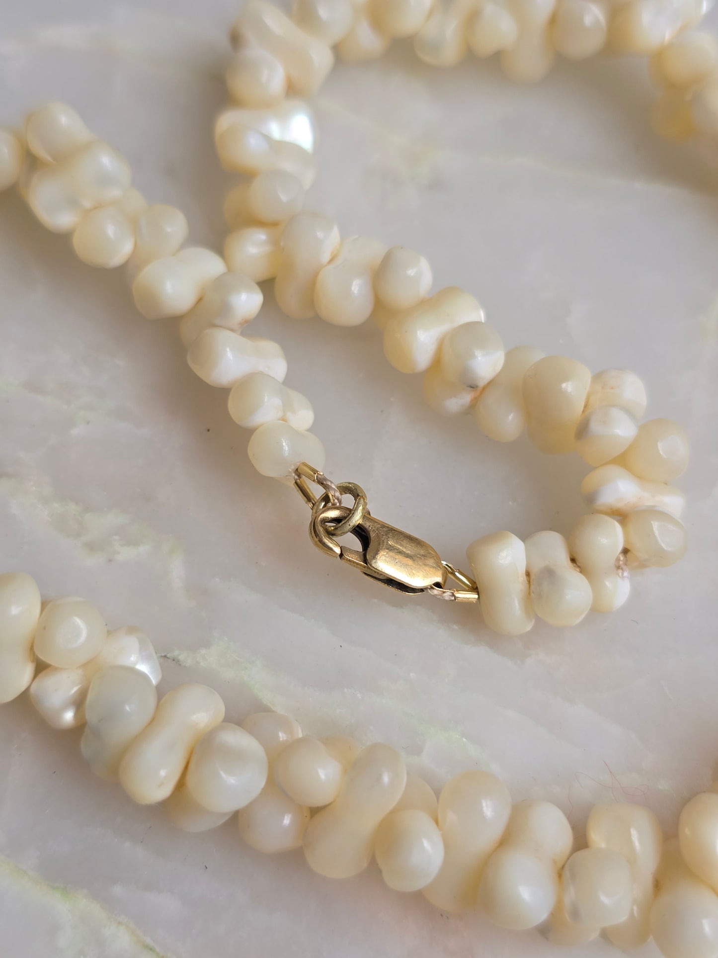 Antique Carved Mother of Pearl Dogbone Necklace